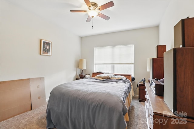 bedroom with carpet flooring and a ceiling fan