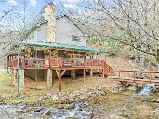 3975 Mountain Creek Rd, Robbinsville, NC 28771 - rear view of property with a deck with water view, metal roof, and a chimney