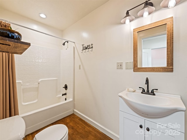 3975 Mountain Creek Rd, Robbinsville, NC 28771 - bathroom with baseboards, toilet, wood finished floors, vanity, and shower / tub combo