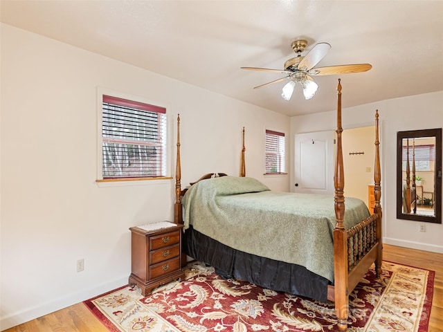 3975 Mountain Creek Rd, Robbinsville, NC 28771 - bedroom with baseboards, ceiling fan, and light wood-style floors
