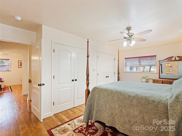 3975 Mountain Creek Rd, Robbinsville, NC 28771 - bedroom with light wood-style floors and ceiling fan