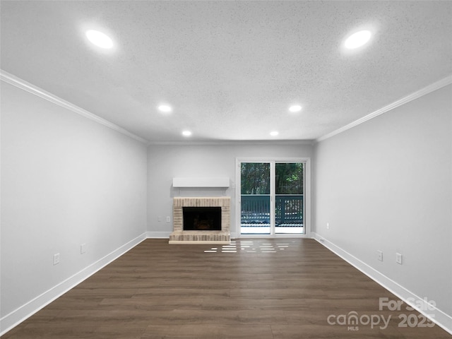 4936 Sardis Rd Unit B, Charlotte, NC 28270 - unfurnished living room featuring a textured ceiling, crown molding, baseboards, a fireplace, and dark wood-type flooring