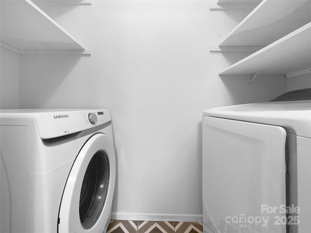 4936 Sardis Rd Unit B, Charlotte, NC 28270 - clothes washing area featuring separate washer and dryer, baseboards, and laundry area