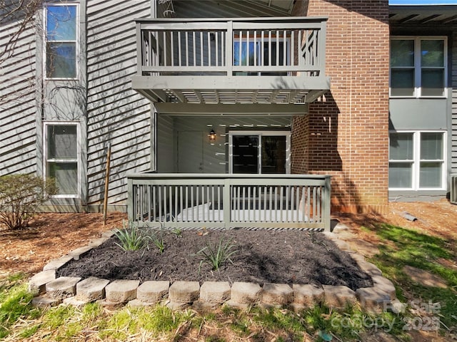 4936 Sardis Rd Unit B, Charlotte, NC 28270 - property entrance featuring brick siding and a balcony