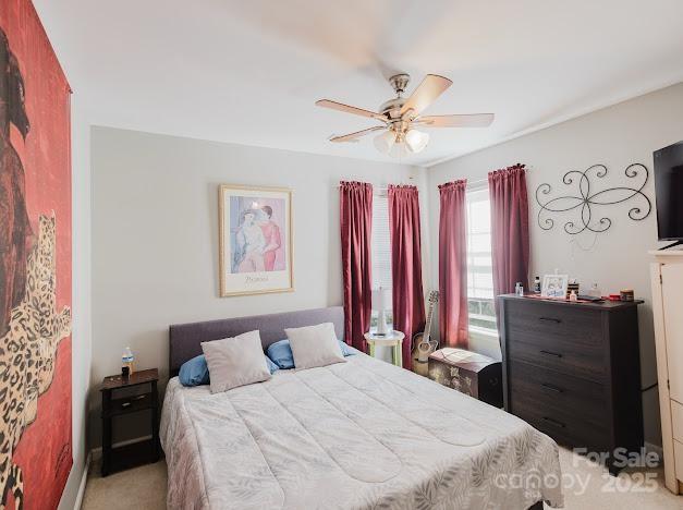 6000 Pine Cone Ln, Monroe, NC 28110 - bedroom featuring a ceiling fan and carpet