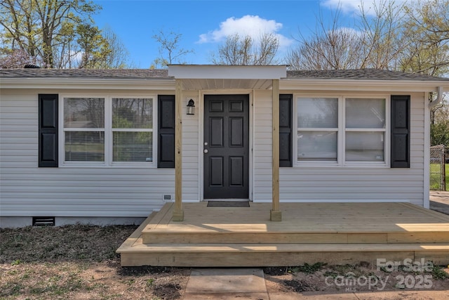 view of front facade with a deck