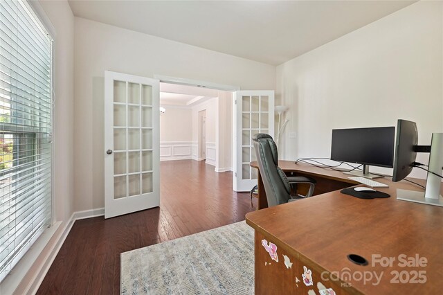9937 Travertine Trl, Davidson, NC 28036 - home office with french doors, wood finished floors, a wainscoted wall, and a decorative wall