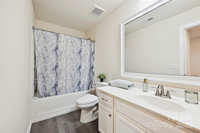 9937 Travertine Trl, Davidson, NC 28036 - full bathroom with wood finished floors, vanity, toilet, and shower / bath combo with shower curtain