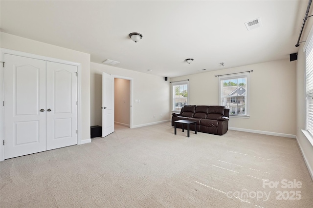 9937 Travertine Trl, Davidson, NC 28036 - sitting room with baseboards and carpet floors
