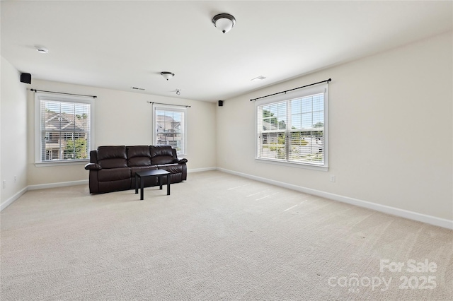 9937 Travertine Trl, Davidson, NC 28036 - living area with baseboards and plenty of natural light