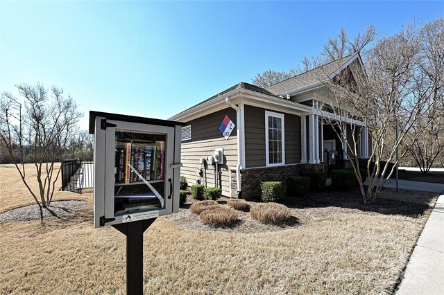 9937 Travertine Trl, Davidson, NC 28036 - view of front facade with stone siding