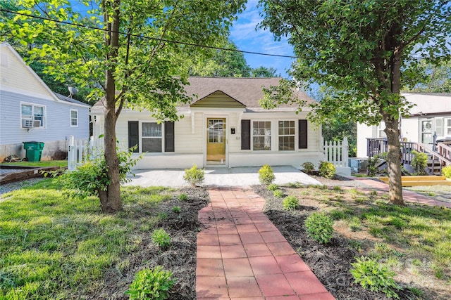 813 N Ave, Charlotte, NC 28208 - view of front of home with cooling unit and a shingled roof