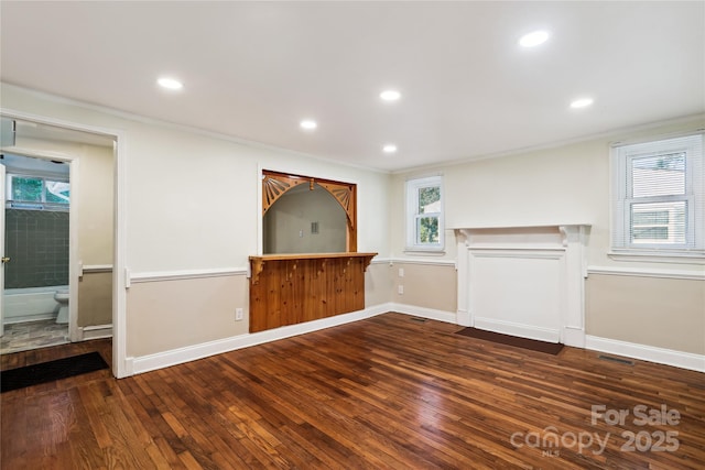 813 N Ave, Charlotte, NC 28208 - unfurnished living room featuring dark wood-style floors, recessed lighting, and crown molding