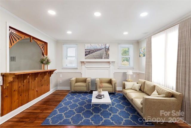 813 N Ave, Charlotte, NC 28208 - living room with crown molding, wood finished floors, and recessed lighting