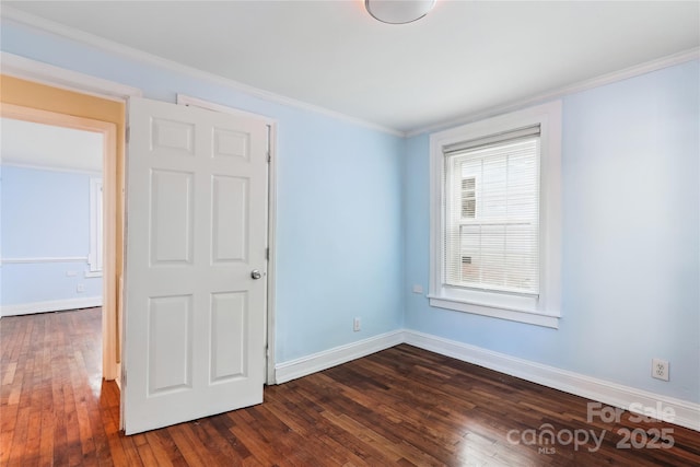 813 N Ave, Charlotte, NC 28208 - unfurnished room featuring ornamental molding and dark wood-type flooring