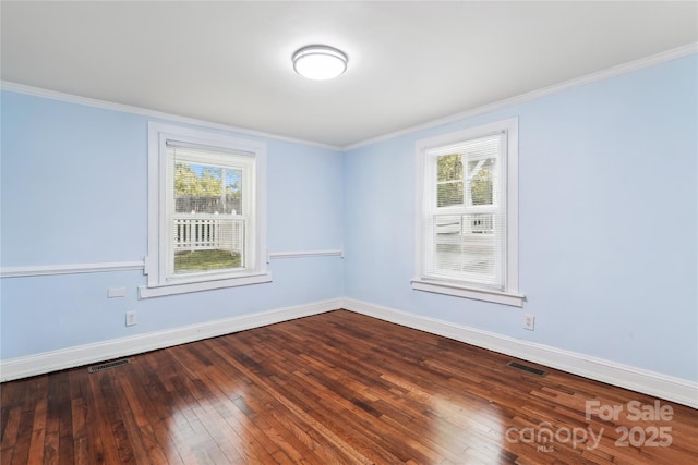 813 N Ave, Charlotte, NC 28208 - spare room with dark wood-style floors and crown molding