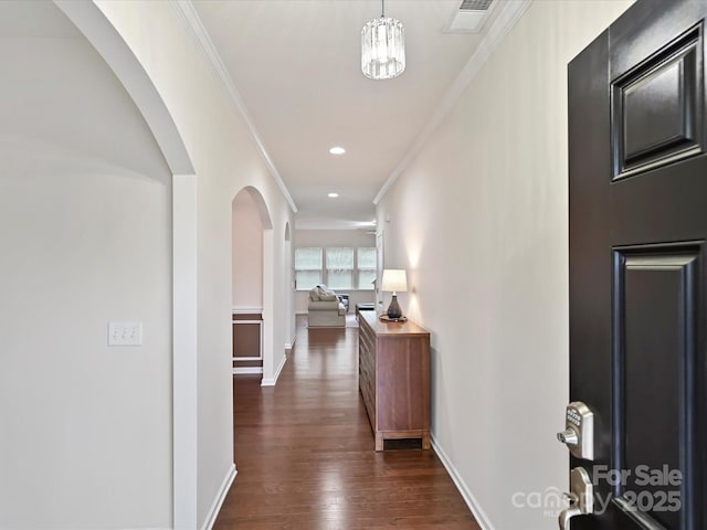 11621 Red Knoll Ln, Pineville, NC 28134 - hallway with arched walkways, dark wood-style flooring, ornamental molding, baseboards, and recessed lighting