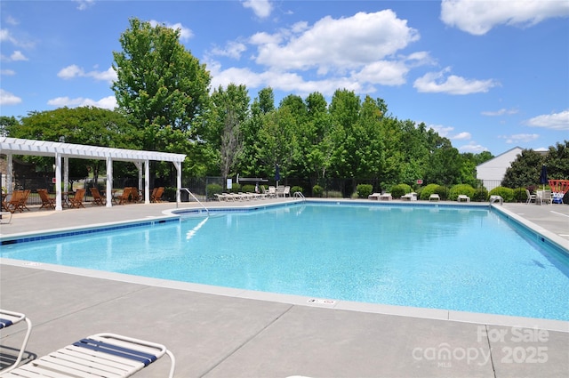 11621 Red Knoll Ln, Pineville, NC 28134 - community pool featuring fence, a pergola, a patio area, and view of scattered trees