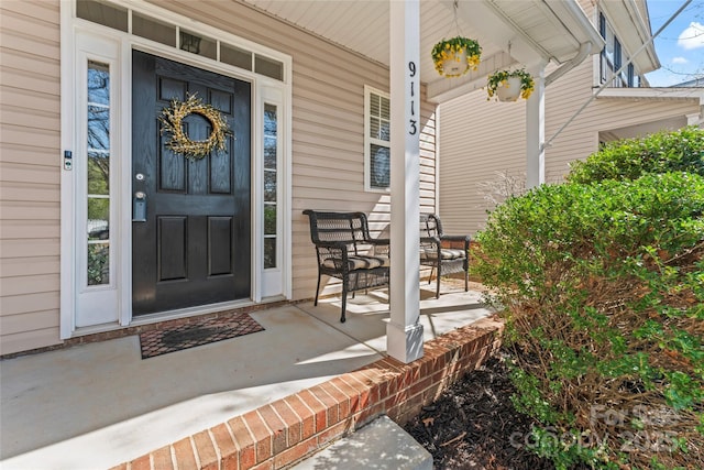 9113 Cinder Ln, Huntersville, NC 28078 - view of exterior entry featuring covered porch
