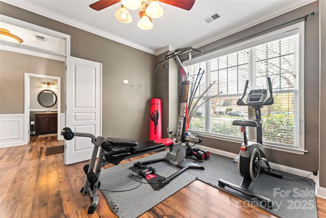9113 Cinder Ln, Huntersville, NC 28078 - exercise room with ornamental molding, visible vents, a ceiling fan, and hardwood / wood-style flooring