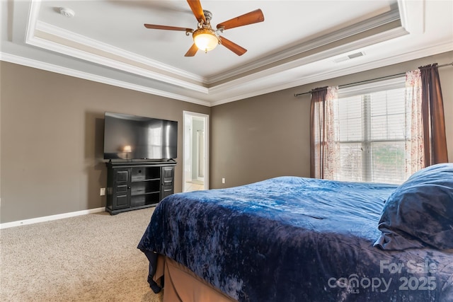 9113 Cinder Ln, Huntersville, NC 28078 - bedroom featuring a tray ceiling, ornamental molding, baseboards, visible vents, and light carpet