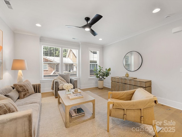 1413 Kenilworth Ave, Charlotte, NC 28203 - living room featuring light wood finished floors, ceiling fan, recessed lighting, and ornamental molding