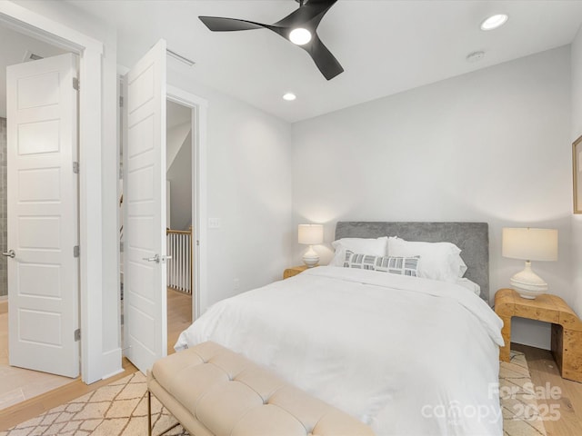 1413 Kenilworth Ave, Charlotte, NC 28203 - bedroom with light wood-style flooring, recessed lighting, and a ceiling fan