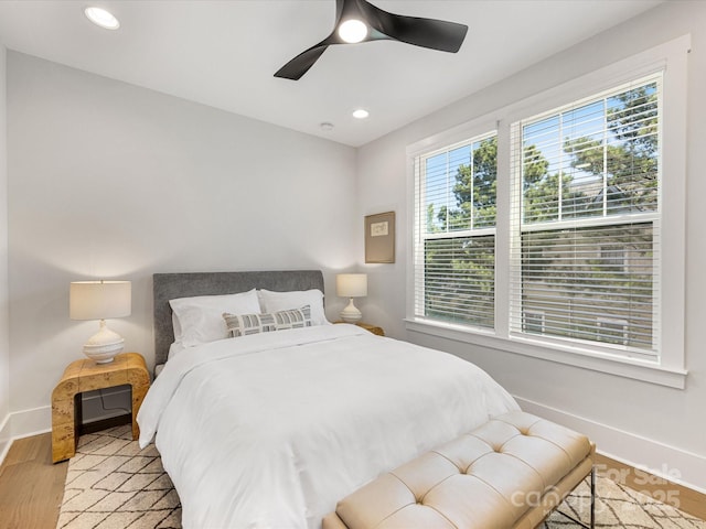 1413 Kenilworth Ave, Charlotte, NC 28203 - bedroom featuring light wood finished floors, recessed lighting, and a ceiling fan