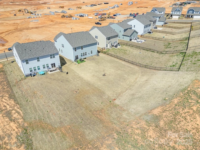 birds eye view of property with a residential view