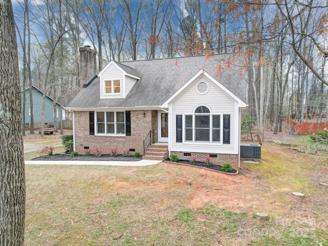 1312 Kensington Pl, Monroe, NC 28112 - view of front of property featuring central air condition unit, roof with shingles, crawl space, a front lawn, and a chimney