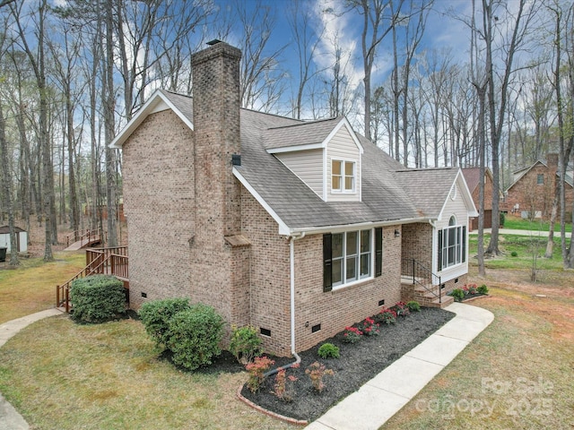 1312 Kensington Pl, Monroe, NC 28112 - view of side of property featuring roof with shingles, a chimney, brick siding, a lawn, and crawl space