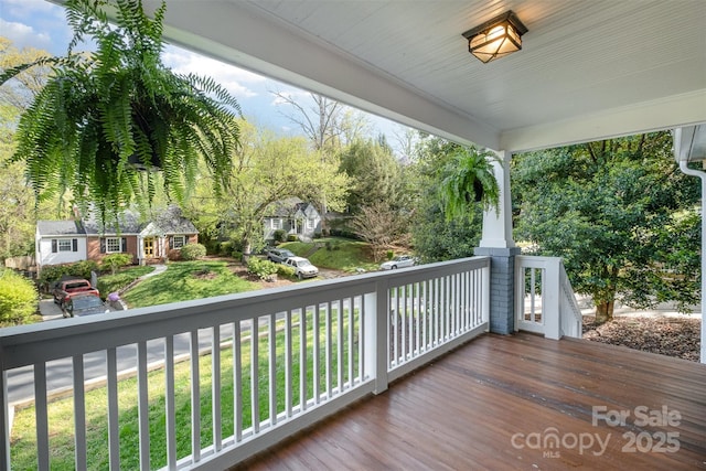 wooden deck featuring covered porch