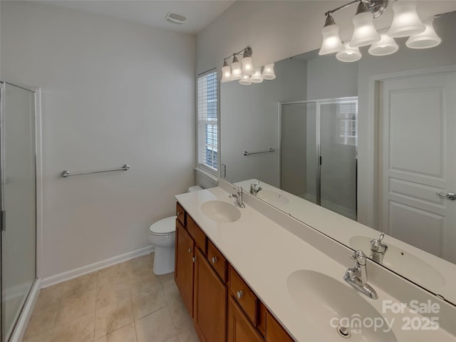 bathroom with a sink and a shower stall