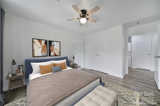 211 Heritage Blvd Unit 301, Fort Mill, SC 29715 - bedroom featuring baseboards, a closet, and wood finished floors