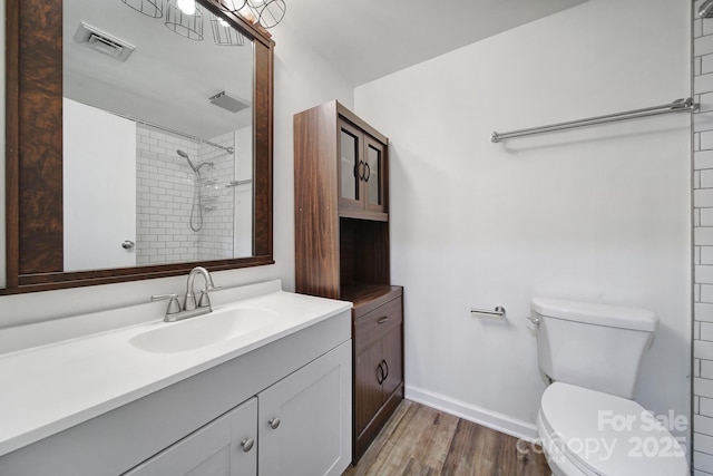 211 Heritage Blvd Unit 301, Fort Mill, SC 29715 - full bathroom featuring vanity, toilet, baseboards, visible vents, and wood finished floors