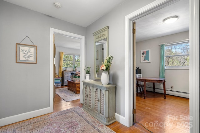 3407 14th Ave SW, Hickory, NC 28602 - corridor with baseboard heating and light wood-style floors