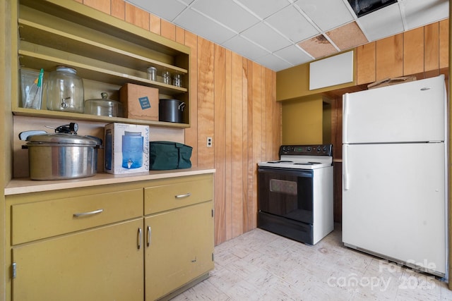 3407 14th Ave SW, Hickory, NC 28602 - kitchen featuring freestanding refrigerator, electric stove, wood walls, light countertops, and open shelves