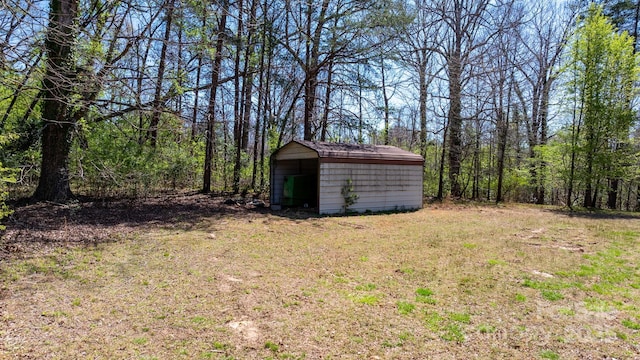 3407 14th Ave SW, Hickory, NC 28602 - view of grassy yard featuring a shed and a forest view