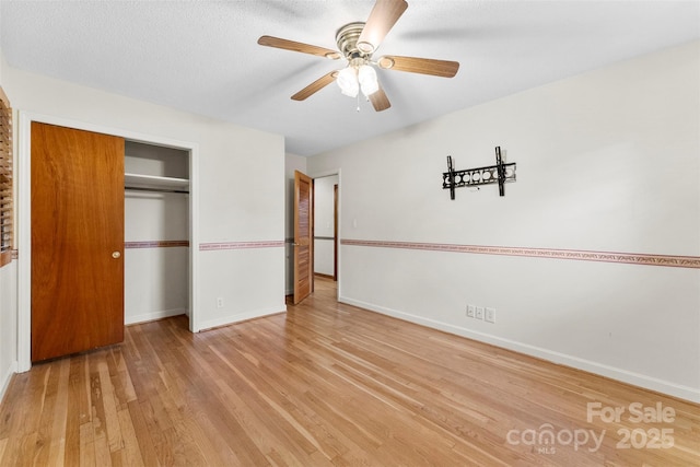 4107 Windwood Dr, Gastonia, NC 28056 - unfurnished bedroom featuring light wood finished floors, a closet, baseboards, and a ceiling fan