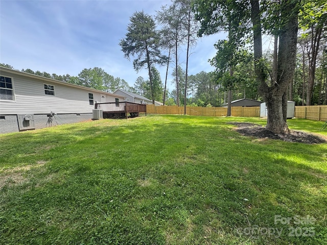 166 Brook Creek Dr, Troutman, NC 28166 - view of yard featuring central AC and a wooden deck