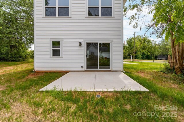 506 Legrand St, Shelby, NC 28150 - rear view of property with a patio area and a lawn