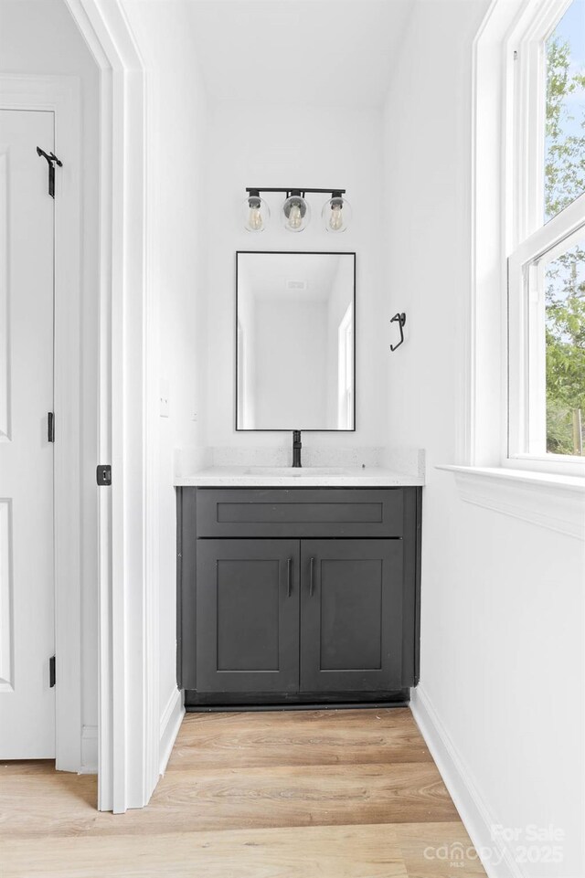 506 Legrand St, Shelby, NC 28150 - bathroom featuring wood finished floors, baseboards, and vanity