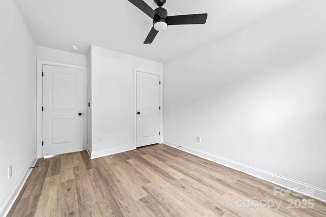 506 Legrand St, Shelby, NC 28150 - unfurnished bedroom with light wood finished floors, baseboards, and a ceiling fan