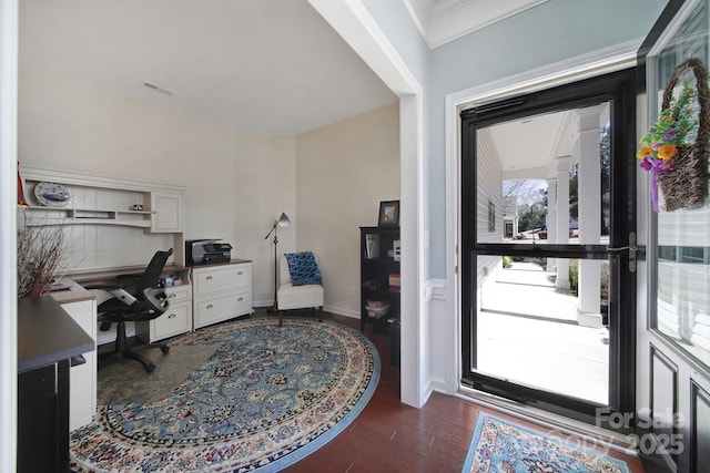 office area with wood finished floors, baseboards, and visible vents