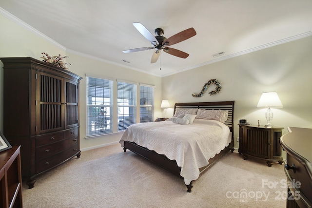 bedroom featuring ornamental molding, visible vents, and light carpet
