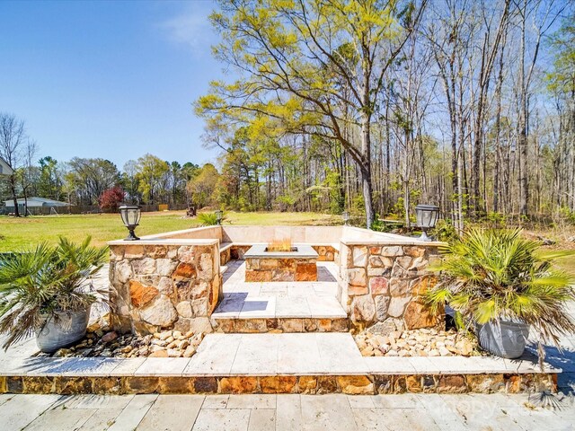 605 Allen Way, Indian Trail, NC 28079 - view of grassy yard featuring an outdoor fire pit