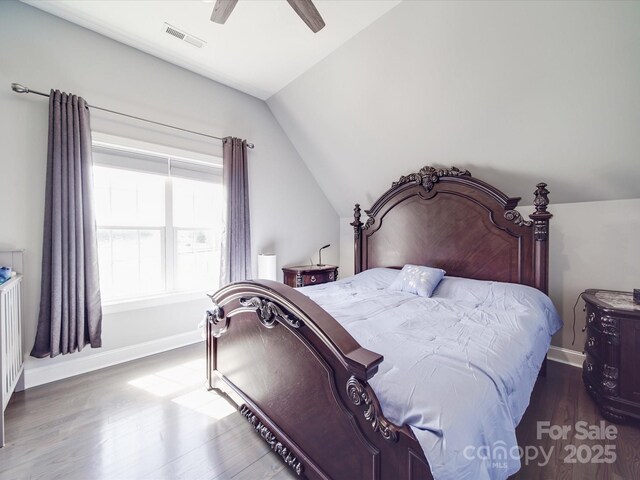 605 Allen Way, Indian Trail, NC 28079 - bedroom featuring vaulted ceiling, wood finished floors, ceiling fan, and baseboards