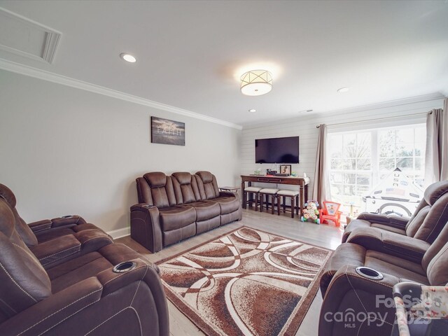 605 Allen Way, Indian Trail, NC 28079 - living area featuring wood finished floors, ornamental molding, recessed lighting, and baseboards