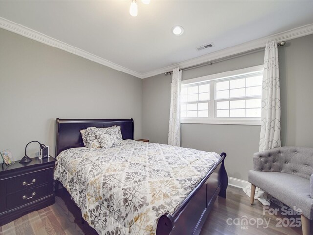 605 Allen Way, Indian Trail, NC 28079 - bedroom with ornamental molding, wood finished floors, baseboards, and recessed lighting