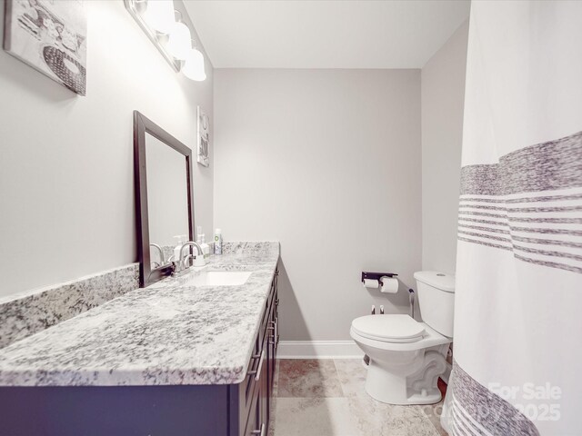 605 Allen Way, Indian Trail, NC 28079 - full bath featuring vanity, toilet, and baseboards